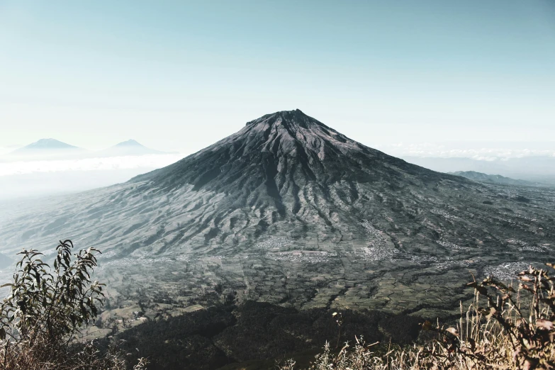 a view of an unpreked mountain and sky