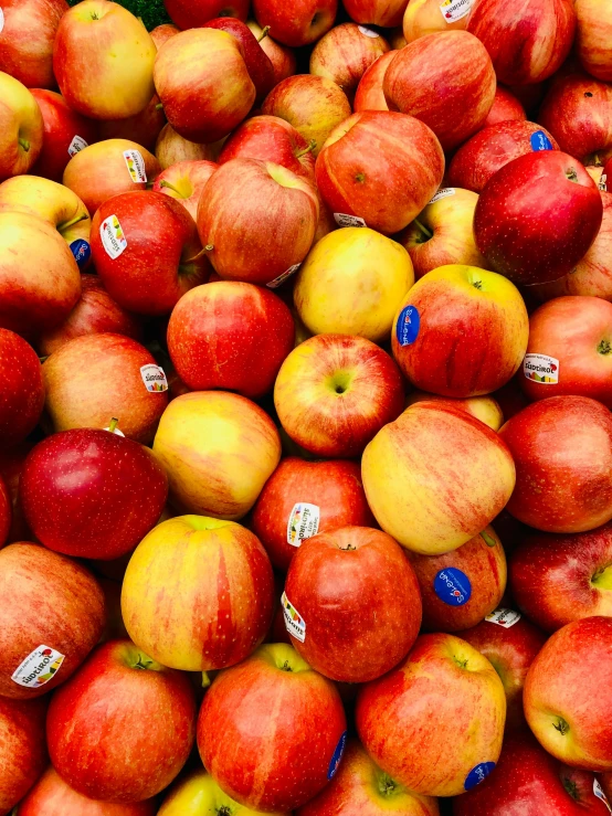 a pile of apples sitting on top of each other, slide show, highly upvoted, red and yellow, lightweight