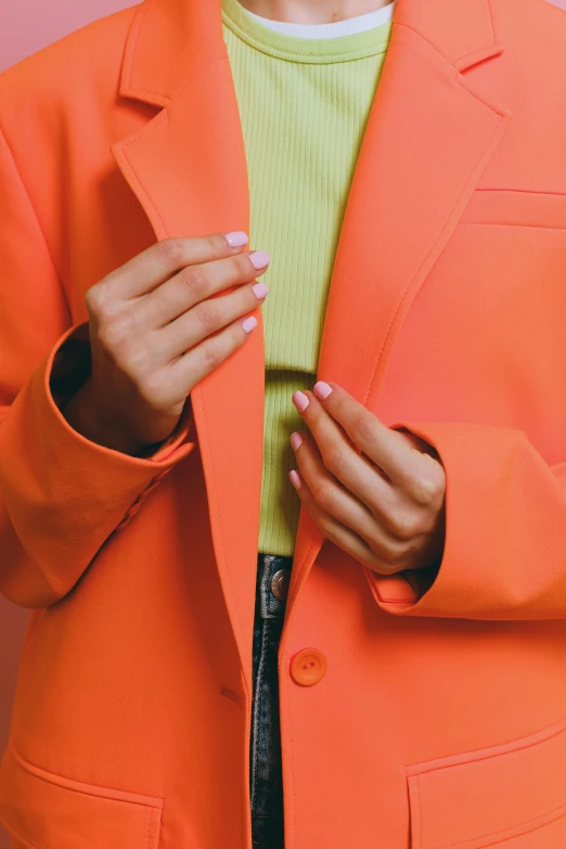 a close up of a person wearing an orange jacket, by Olivia Peguero, color field, sleek hands, touching her clothes, wearing a blazer, (neon colors)