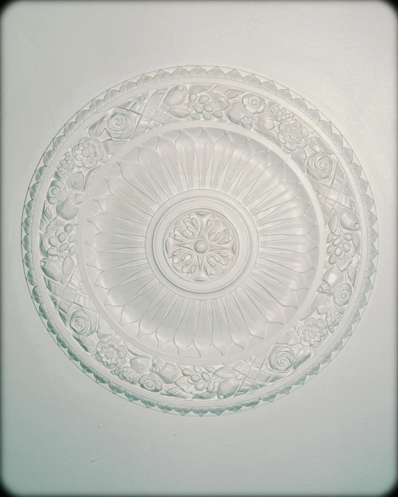 a glass plate sitting on top of a table, inspired by Luca della Robbia, white ceiling, jelly - like texture. photograph, 1996), ( art deco )