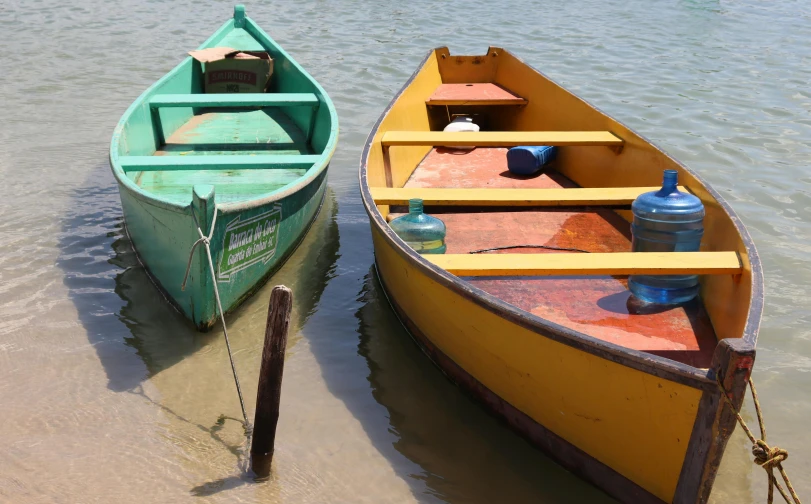 a couple of boats that are sitting in the water, pexels contest winner, hurufiyya, jamaican colors, skiff, avatar image, very crisp details