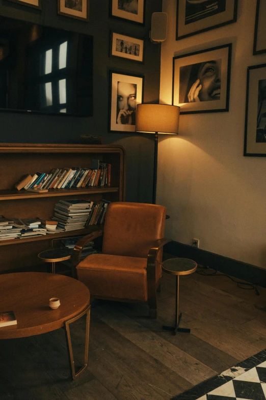 a living room with a large bookcase in the corner