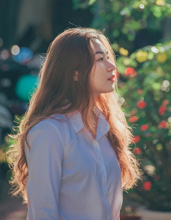 a woman with long red hair wearing a white shirt, inspired by Kim Jeong-hui, trending on unsplash, faded color film, cinematic. by leng jun, nice afternoon lighting, cinematic outfit photo