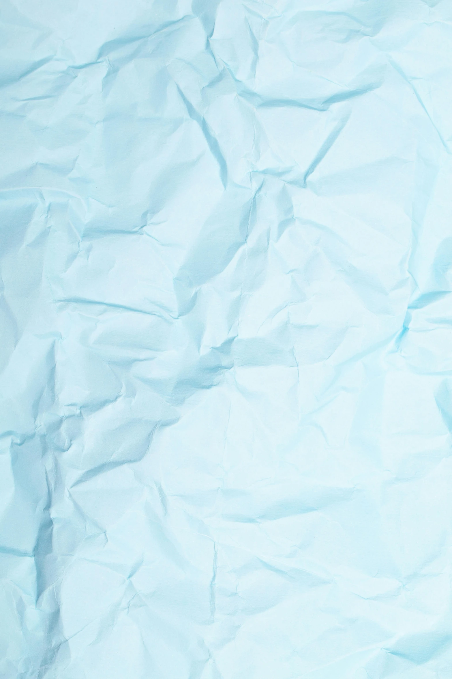 a blue piece of paper that has been wrinkled