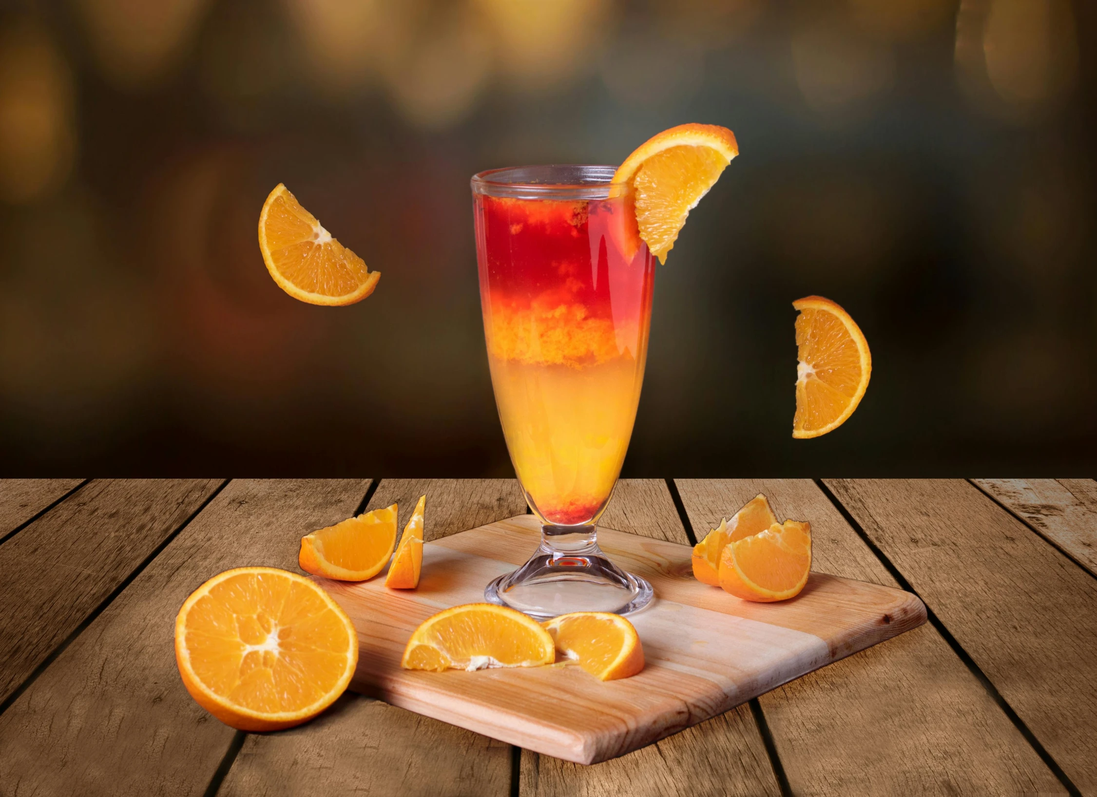 a glass of orange juice sitting on top of a wooden table, multicoloured, epic red - orange moonlight, high quality product image”, iced tea glass