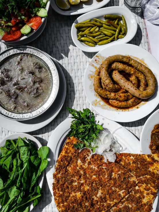 a number of plates of food on a table, a photo, pexels contest winner, dau-al-set, turkey, thumbnail, exterior, high quality picture