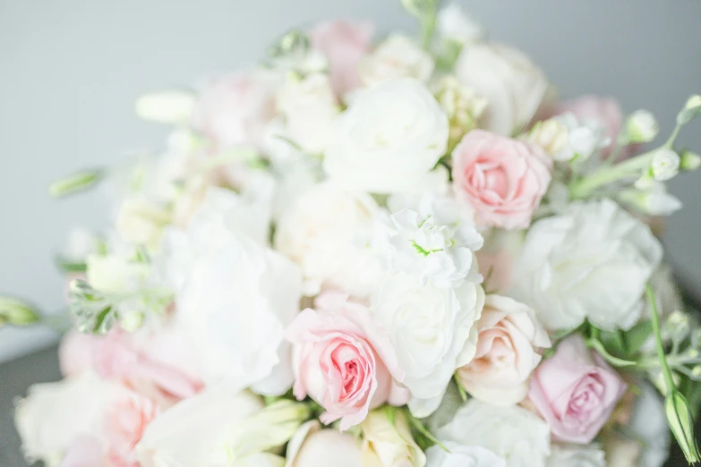 a bouquet is laying in a box on a table