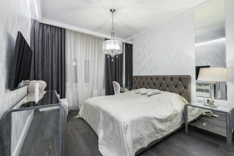 this modern bedroom has a large crystal - topped bed