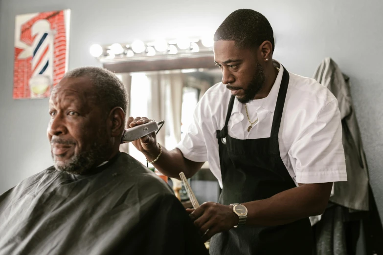 a man getting his hair cut by a barber, by Dan Frazier, pexels contest winner, : kendrick lamar, morgan freeman as gordon freeman, 15081959 21121991 01012000 4k, essence