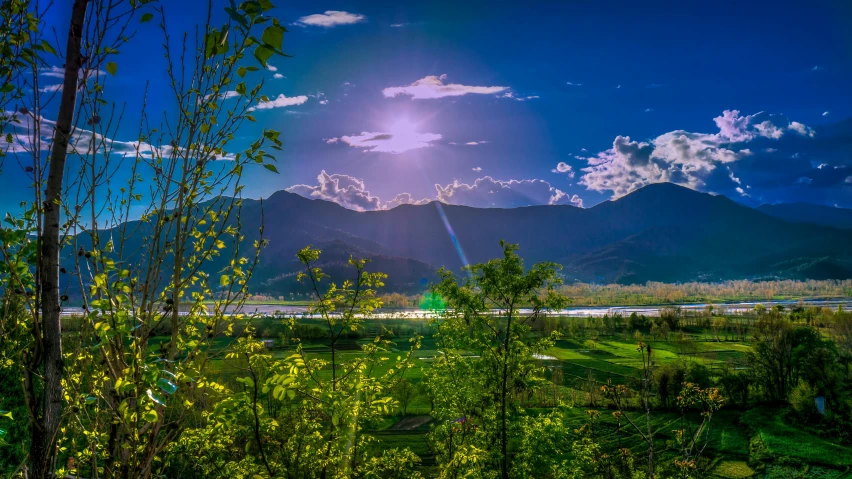 the sun shines brightly over the mountains, a picture, by Muggur, pexels contest winner, lush surroundings, lake view, spring light, post processed