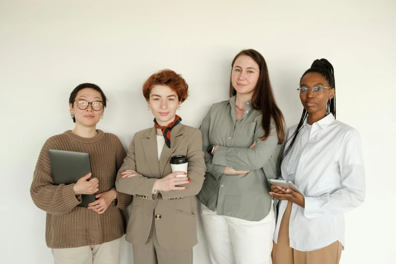 a group of women standing next to each other, trending on pexels, renaissance, avatar image, brown, professional image, academic clothing