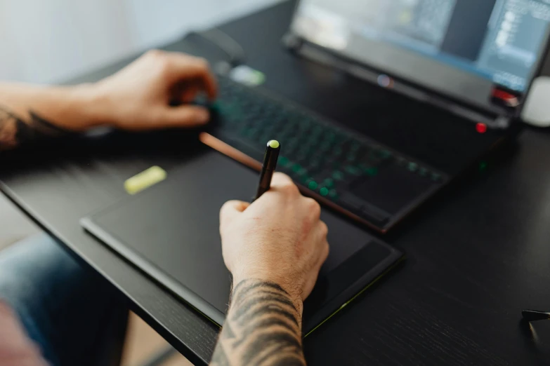 a man sitting at a desk using a laptop computer, a drawing, trending on pexels, draw with wacom tablet, close up to the screen, written in a neat, gaming