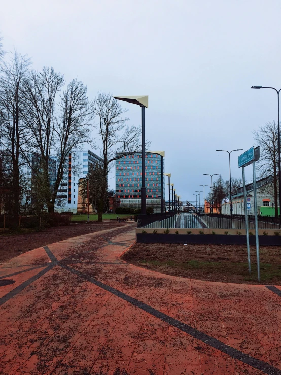 a dirt road in the middle of a city, espoo, neon signs in the distance, in style of brutalism, in legnica!!!