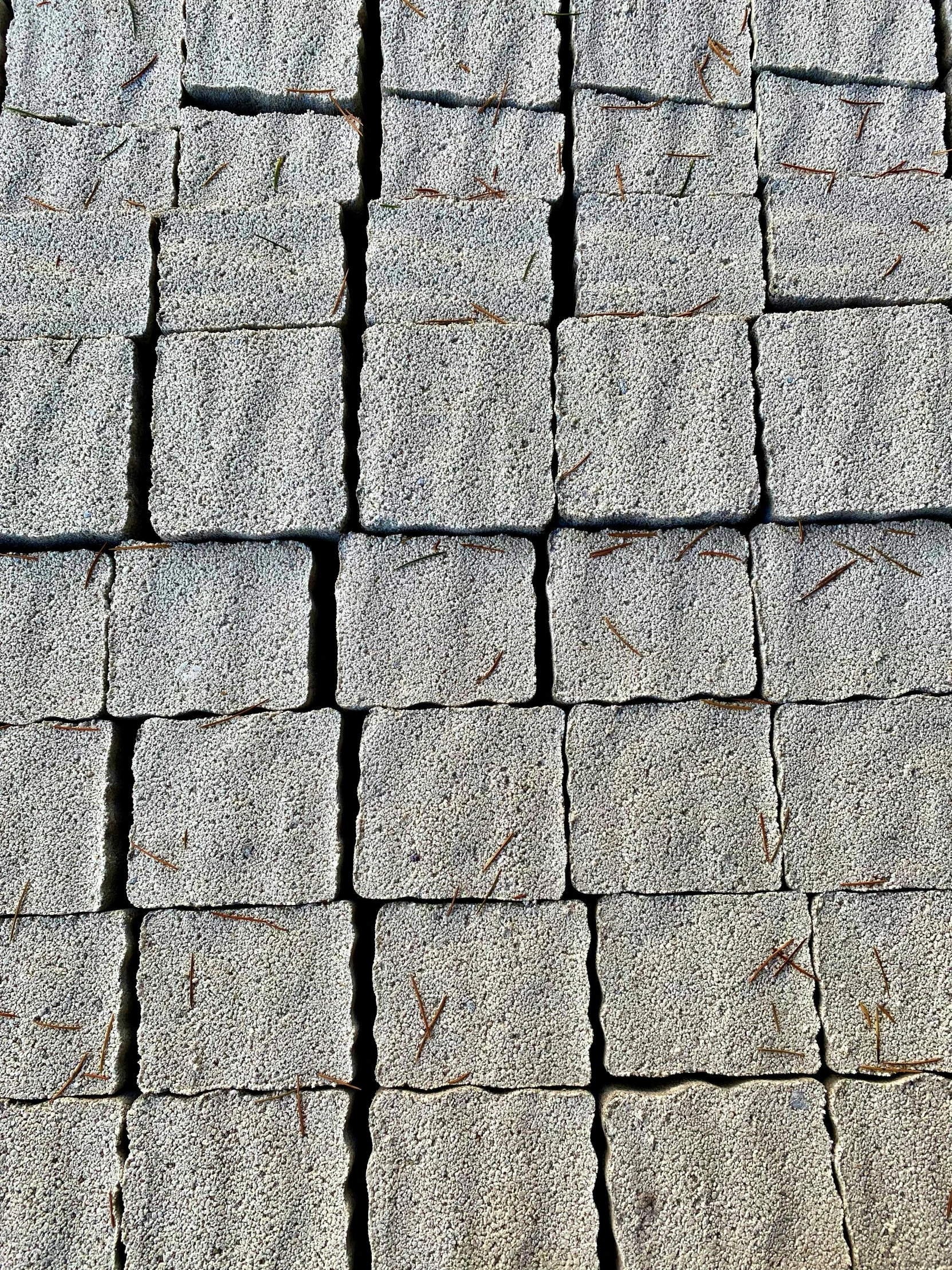 a sidewalk that is made out of bricks