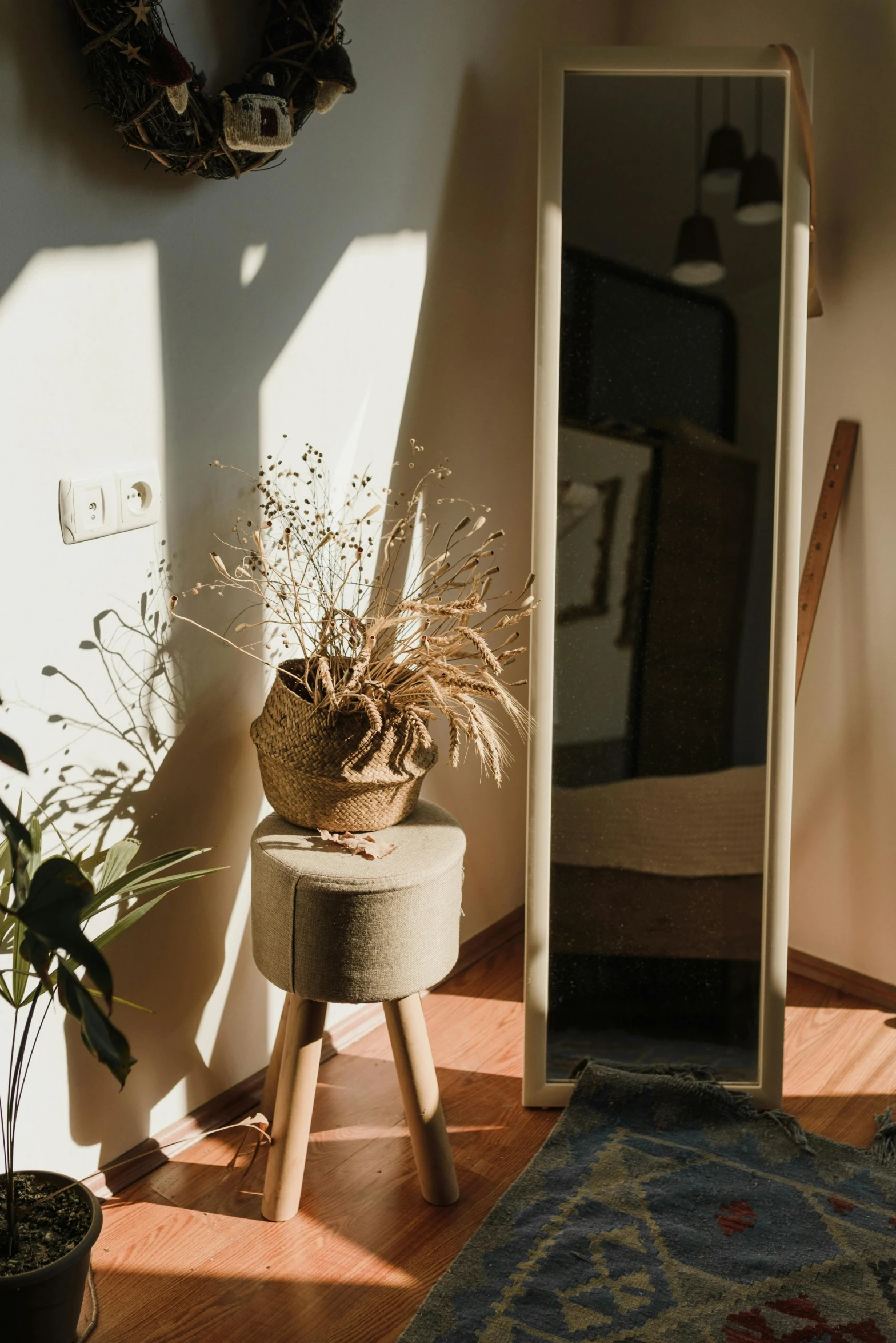 a chair and a mirror in a room