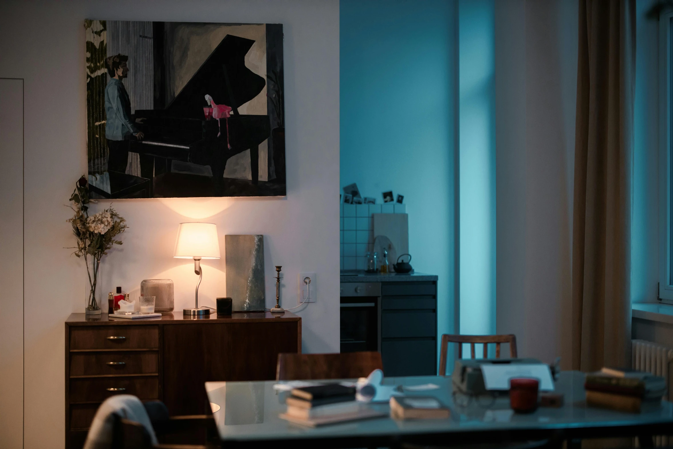 the walls and floor in this dining room are lit by a light from a light turned on