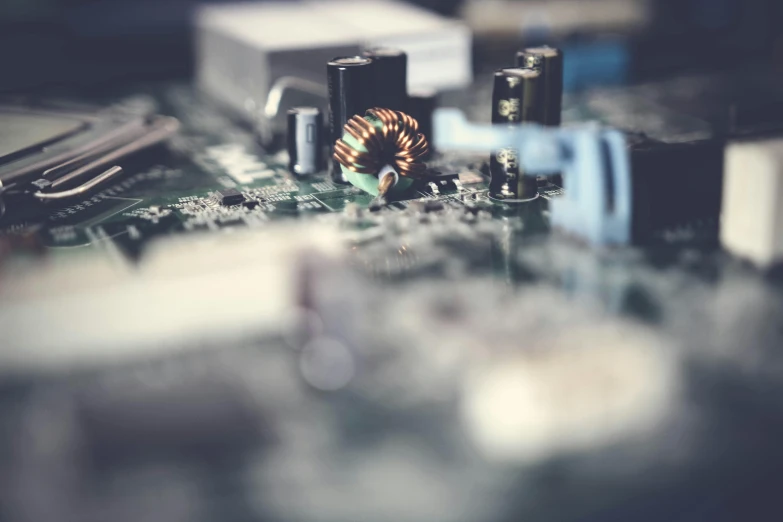 a close up of a computer mother board, a macro photograph, unsplash, retro stylised, instagram photo, built on a small