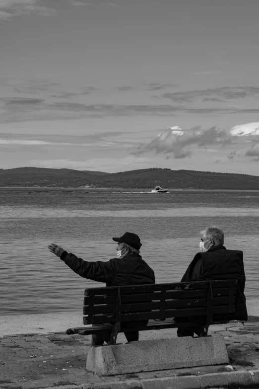 a couple of people that are sitting on a bench, by Tamas Galambos, skye meaker, fisherman, take my hand, people