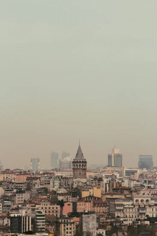 a view of a city from the top of a hill, an album cover, by Cafer Bater, pexels contest winner, baroque, ground haze, istanbul, pale beige sky, today\'s featured photograph 4k