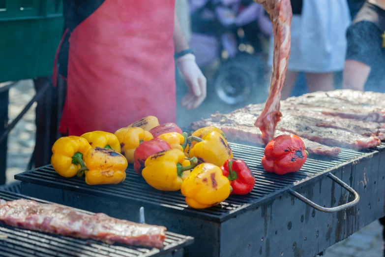 a close up of a grill with meat and vegetables on it, by Niko Henrichon, pexels, renaissance, festival, pepper, thumbnail, 3 colours