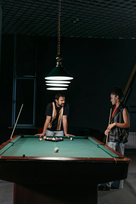 a group of people playing a game of pool, by Elsa Bleda, two young men, aykut aydogdu eric zener, cinematic image