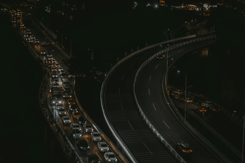 an aerial view of a long and busy road