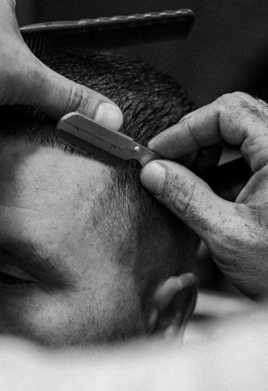 black and white pograph of hands  hair