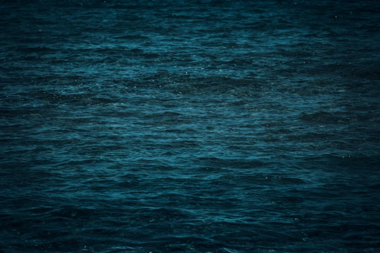 a person on a surfboard in the middle of the ocean, inspired by Elsa Bleda, hurufiyya, dark blue water, wallpaper - 1 0 2 4, dark teal, texture
