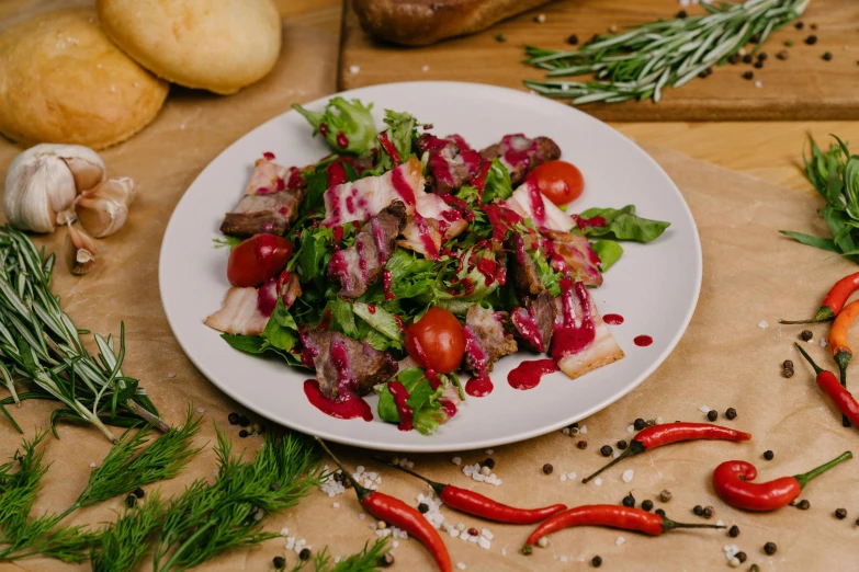 a close up of a plate of food on a table, profile image, havrylo pustoviyt, reds, full product shot