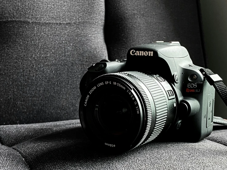 a black and white photo of a camera, a picture, by Carey Morris, unsplash contest winner, canon eos rebel, product photography 4 k, interior photography, bronze!! (eos 5ds r