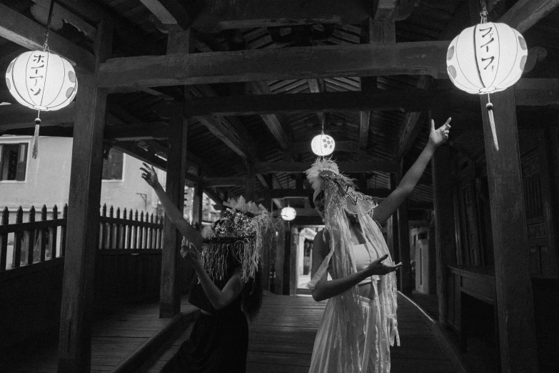 a black and white photo of a bride and groom, unsplash, sōsaku hanga, jellyfish shrine maiden 8k, creepy themed, everyone having fun, bridge