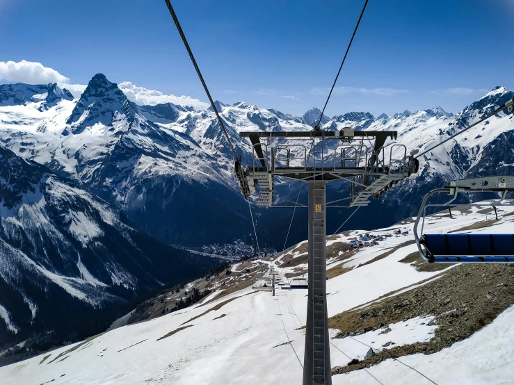 a ski lift going up the side of a mountain, by Matthias Stom, pexels contest winner, 💋 💄 👠 👗, icy glaciers, avatar image, thumbnail