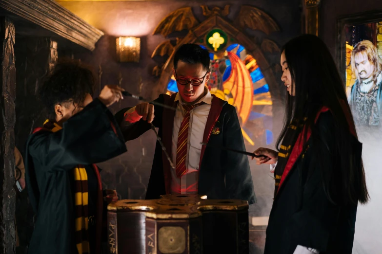 a group of people playing a game of harry potter potter potter potter potter potter potter potter potter potter potter potter potter potter potter potter potter potter potter, by Fuller Potter, pexels contest winner, wearing headmistress uniform, with cinematic lighting, playing drums, cai xukun