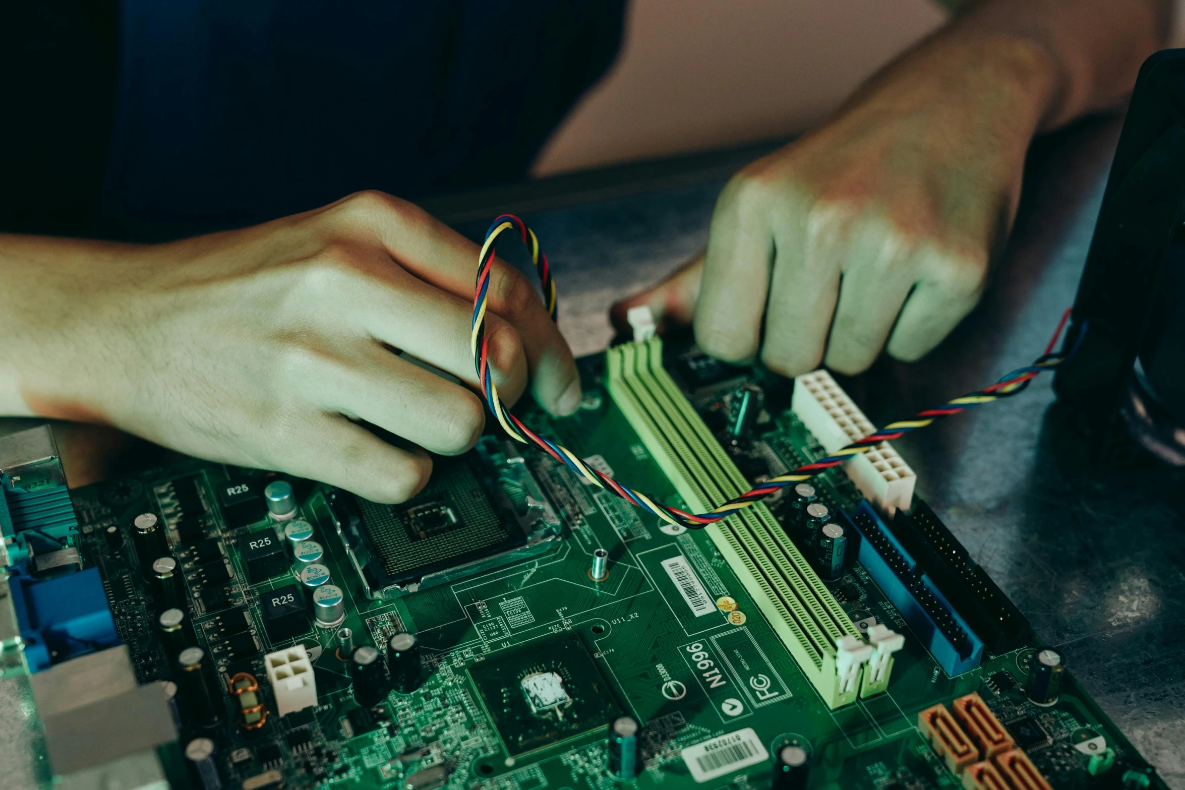 a close up of a person working on a computer, motherboard, a green, teenage engineering moad, ilustration