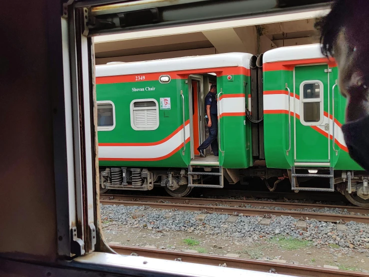 a horse looking out the window of a train, hurufiyya, orange and green power, random circular platforms, 🚿🗝📝