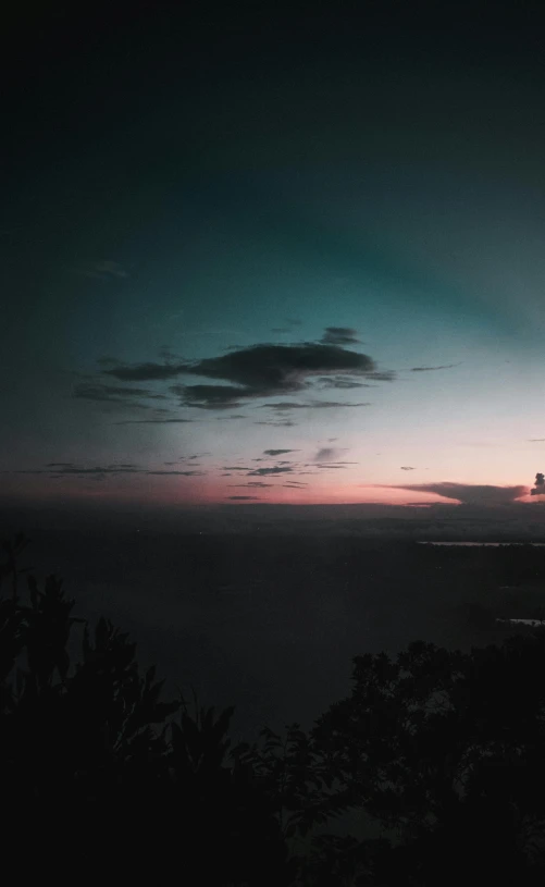 the sun sets over the ocean as seen from the top of a hill, unsplash contest winner, romanticism, pink and blue and green mist, night sky; 8k, desaturated, panoramic photography