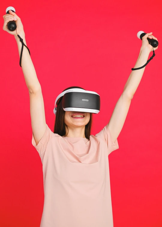 a woman wearing a virtual reality headset on a red background, pexels contest winner, triumphant pose, vines, digital medical equipment, vanilla