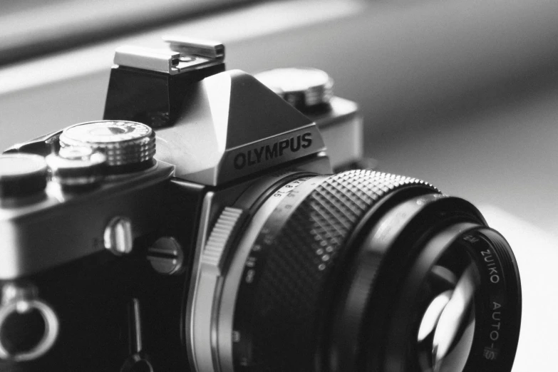 a black and white photo of a camera, by Adam Marczyński, unsplash, photorealism, olympus platform, close-up!!!!!, olympus, medium format digital camera