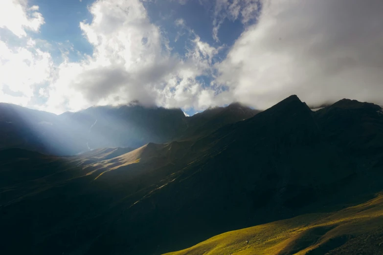 an upclose view of some mountains in the distance