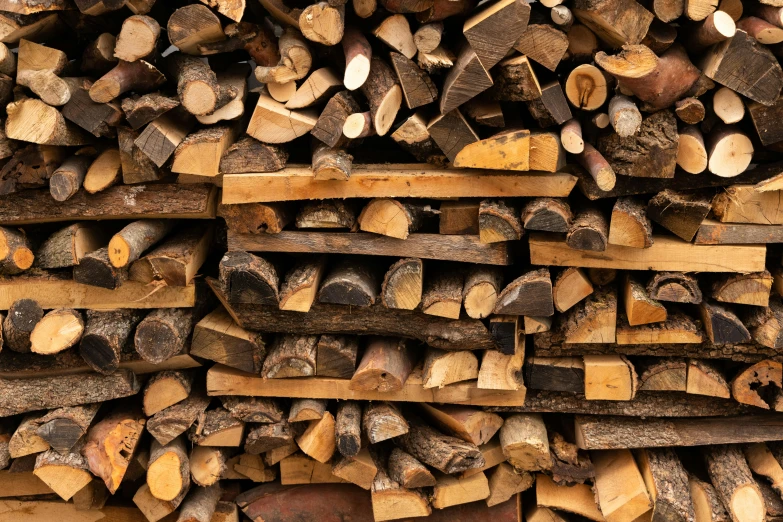 a pile of wood stacked on top of each other, by Jesper Knudsen, unsplash, fan favorite, woodfired, hyper - realistic, thumbnail