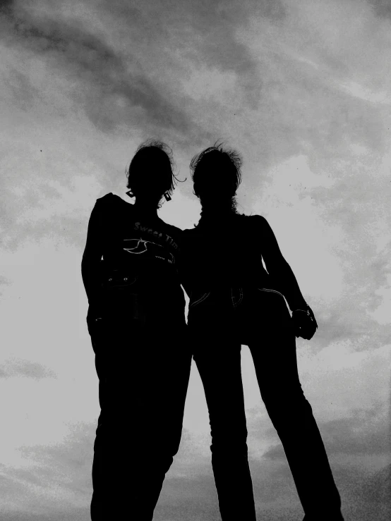 a couple of people standing next to each other, by Lizzy Ansingh, desaturated!!, lesbians, sky!!!, pose 4 of 1 6