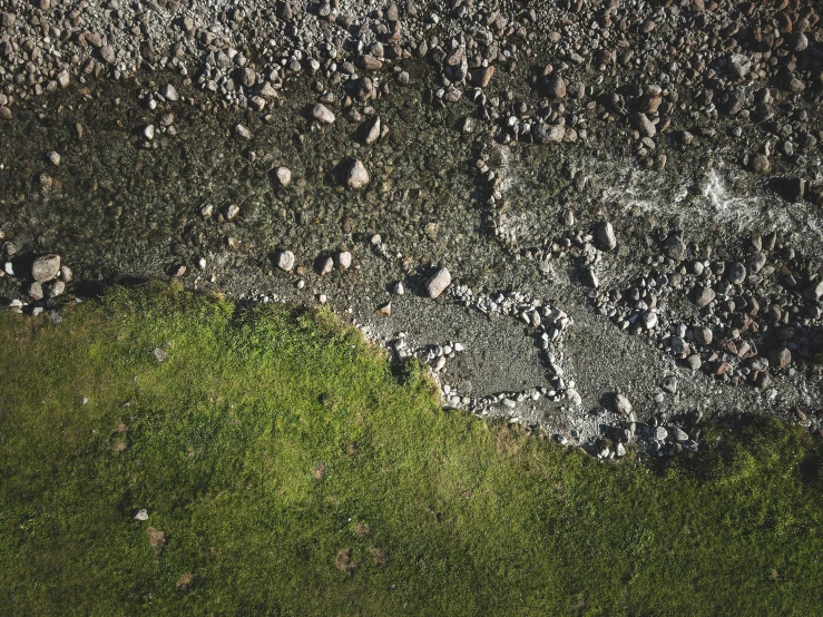 aerial view of rock and green grassy area