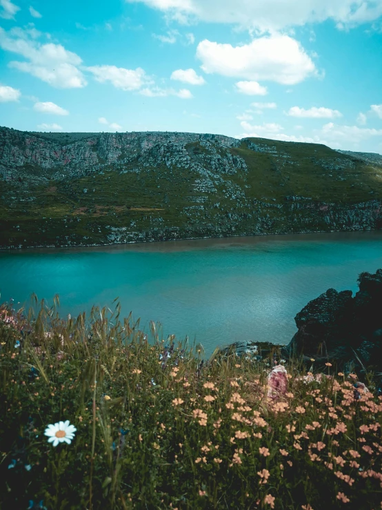 the view of a lake that looks like it's in a land