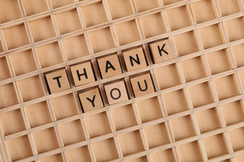 a wooden sign that says thank you, a picture, by Arabella Rankin, shutterstock, square, detailed grid as background, me, construction