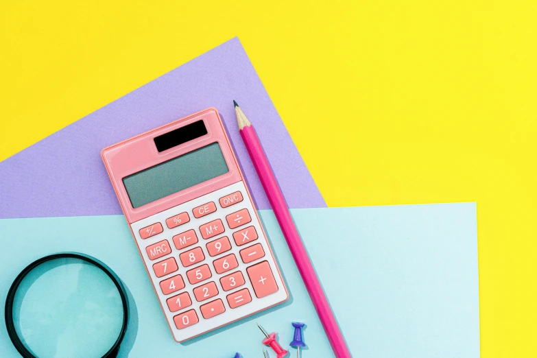 a pink calculator sitting on top of a piece of paper, blue and yellow theme, educational supplies, thumbnail, instagram post