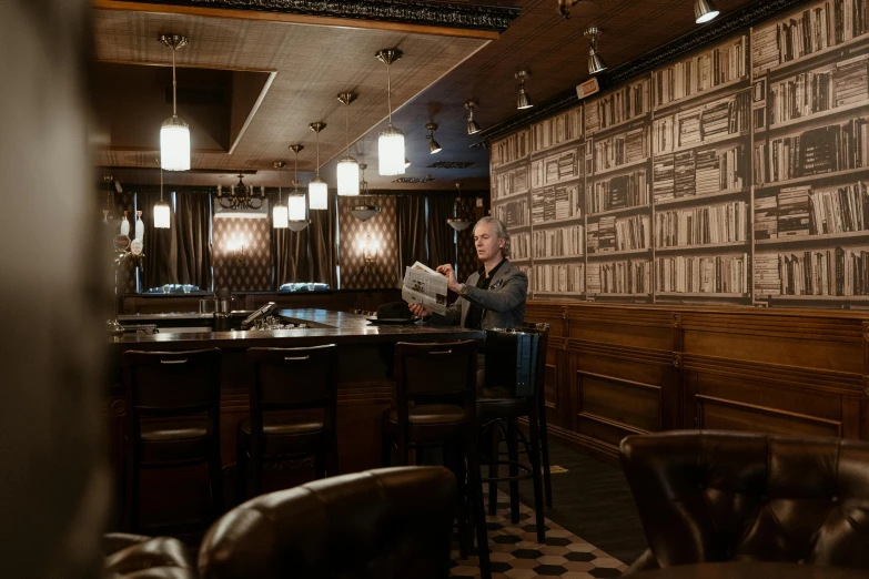 a man sitting at a bar reading a newspaper, unsplash, private press, inside a grand, back room, anomalisa, thumbnail