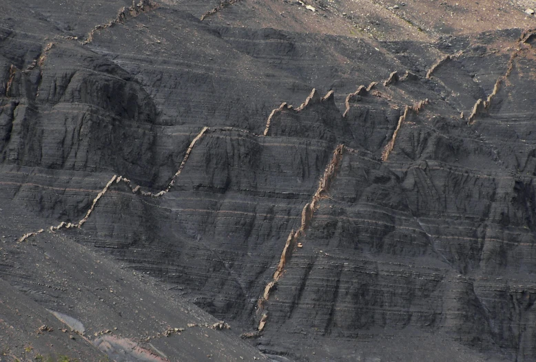 a horse that is standing in the dirt, an ultrafine detailed painting, by Yasushi Sugiyama, pexels contest winner, hurufiyya, shiny layered geological strata, “ aerial view of a mountain, made of tar, wall structure