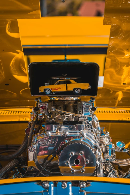 a close up of the engine of a car, inspired by Ed Roth, pexels contest winner, photorealism, yellow, 15081959 21121991 01012000 4k, close full body shot, lowriders