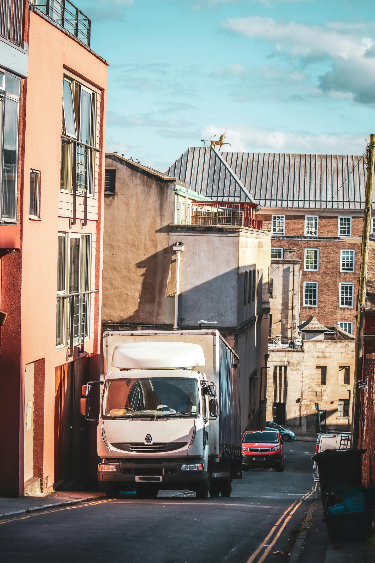 trucks parked in the side of the street