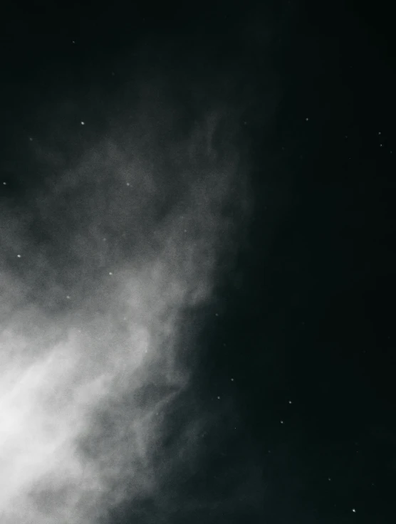 two airplanes flying in the air on a cloudy day